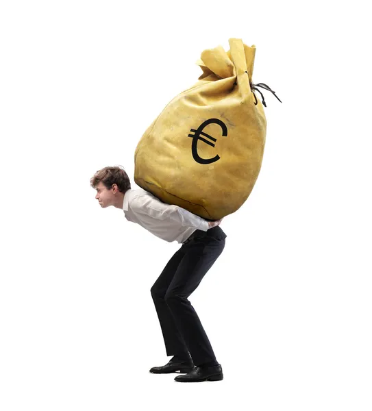 Isolated young businessman carrying a money-bag on his shoulders — Stock Photo, Image