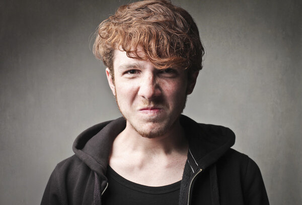 Young man with angry expression