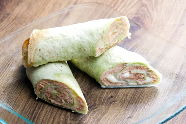 Spinach tortilla filled with salmon and mozzarella — Stock Photo, Image