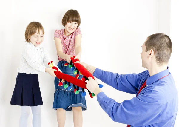 Father playing with his daughters — Stock Photo, Image