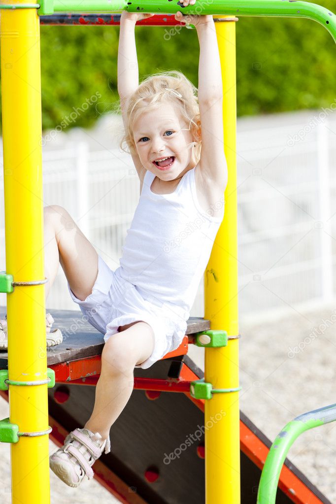 Little girl at playground Stock Photo by ©phb.cz 9970983