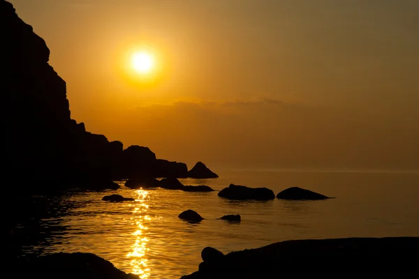 Deniz günbatımı sahnesinde — Stok fotoğraf