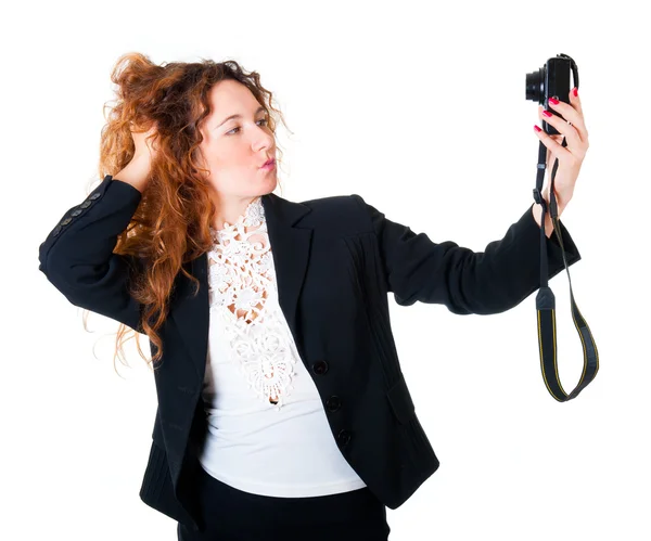 Jonge vrouw maakt zelfportretten — Stockfoto