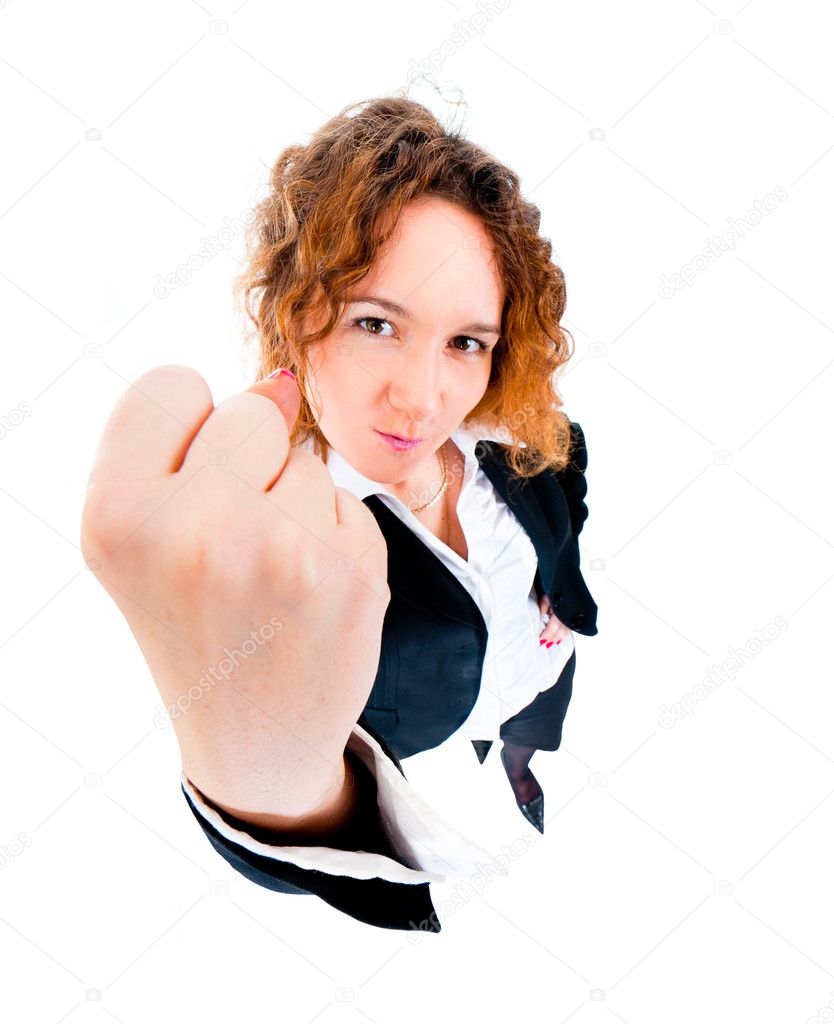 Angry business woman threatened by fist.