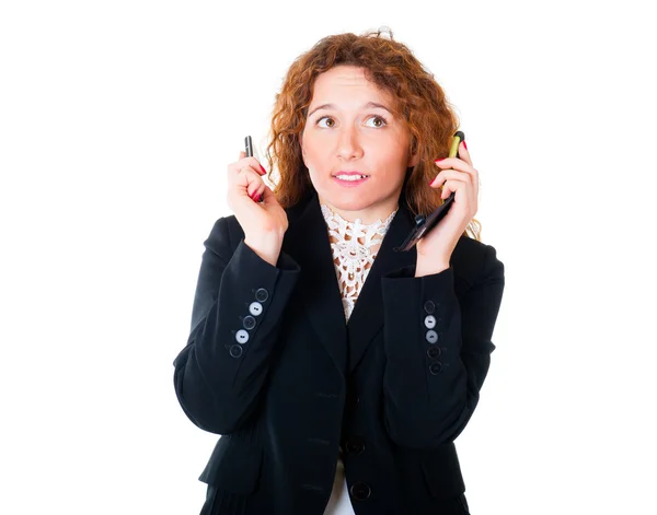 Молодая деловая женщина с двумя мобильными телефонами — стоковое фото