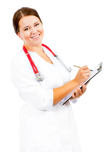 Woman doctor writing — Stockfoto