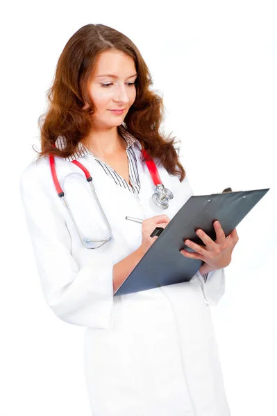 Woman doctor writing — Stock Photo, Image