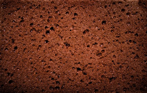 Fondo texturizado - macro vista de esponja marrón — Foto de Stock