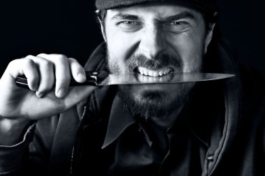 Tough guy with knife clipart