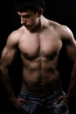 Fine art image of muscular sexy shirtless man clipart