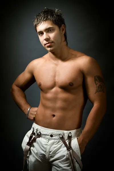 Studio portrait of shirtless sexy muscular man — Stock Photo, Image
