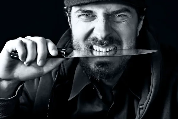 Tough guy with knife — Stock Photo, Image