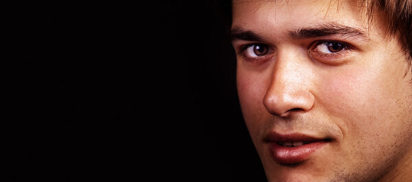 Face of one handsome friendly man with copy space