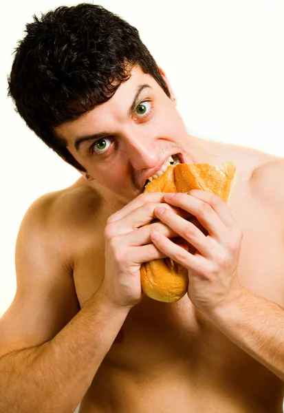 stock image Unhealthy food - hungy man eating bread