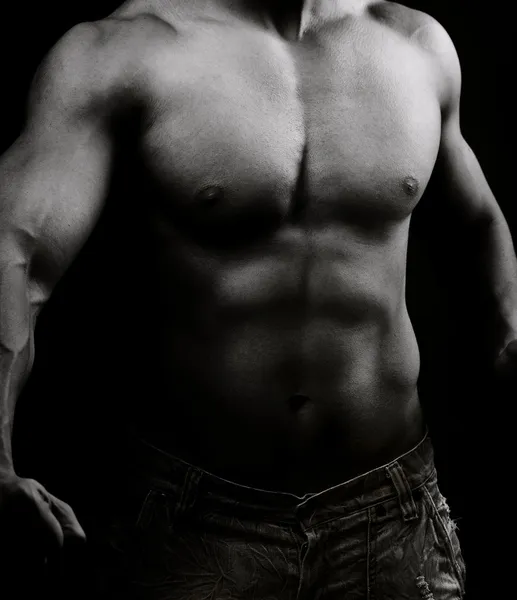 Artistieke foto van gespierde mannelijk lichaam — Stockfoto