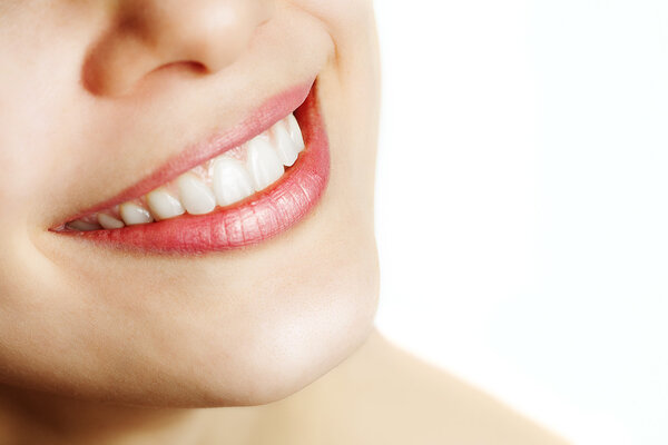 Fresh smile of woman with healthy teeth