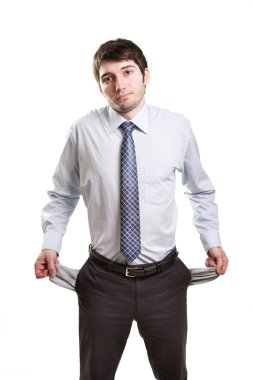 Sad and broke businessman with empty pockets clipart