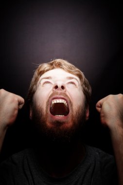 Scream of rebellion - angry furios man