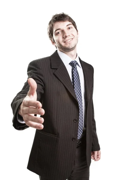 Obchodní dohoda - oblek muže nabízející handshake — Stock fotografie