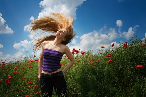 Happy joyful woman in beautiful poppy field — Stock Photo, Image