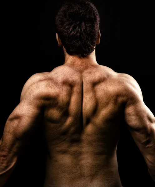 Homem com costas fortes musculares — Fotografia de Stock