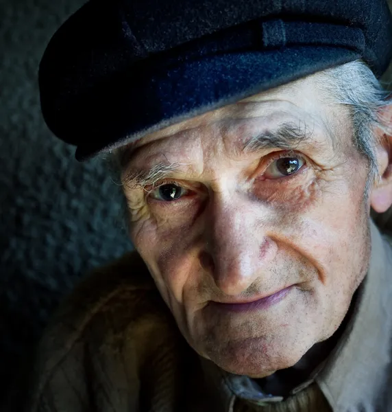 Artistic portrait of friendly senior old man — Stock Photo, Image