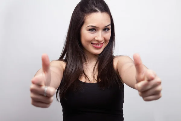 Cute happy woman pointing or showing — Stock Photo, Image