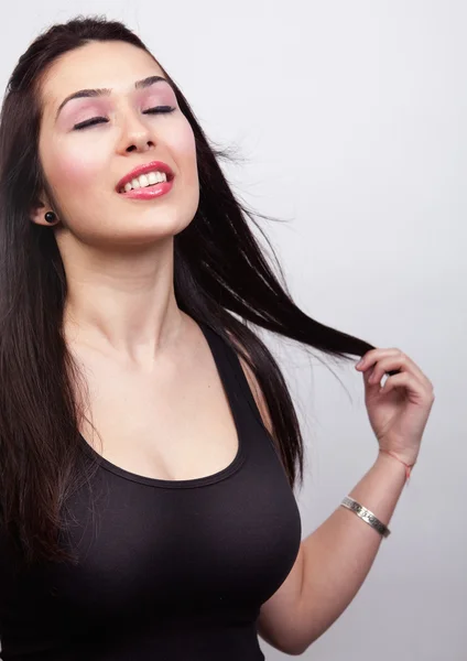 Smyslná sexy žena s dlouhými tmavými vlasy — Stock fotografie