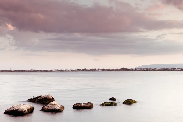 Stock image Peaceful seascape - water sky and rocks