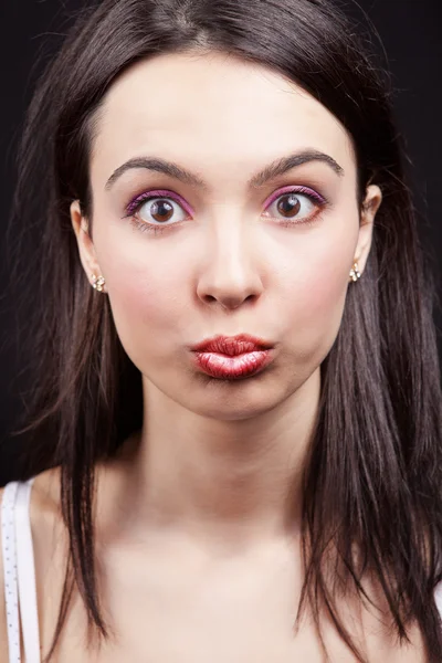 Woman with funny and surprise expression on face Stock Image