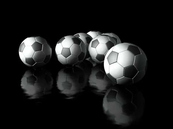 Skupina fotbalu v tmavém pozadí 3d objekty — Stock fotografie