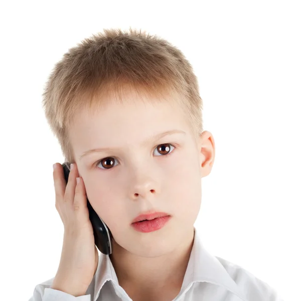 Мальчик и телефон — стоковое фото
