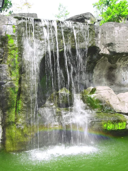 Waterfall and rainbow — Stock Photo, Image