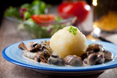 Bavarian mushroom sauce with potato dumpling clipart