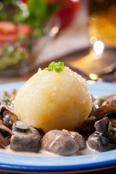 stock image Bavarian mushroom sauce with potato dumpling