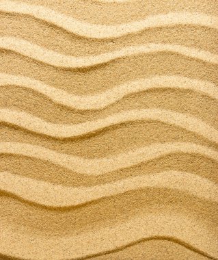 Abstract background. Pure golden sand. Wind and water have created a small dune. clipart