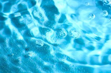 Blue abstract water with bubbles in water ripple. Macro. Closeup. Copy-spac clipart