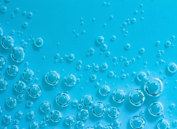 Blue abstract water with bubbles. Macro. Closeup. Horizontal. — Stock Photo, Image