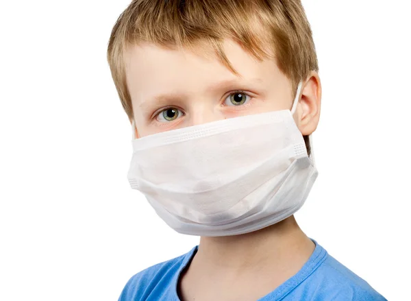 Malattia influenzale bambino ragazzo in medicina assistenza sanitaria maschera chirurgica isolato sopra wh — Foto Stock