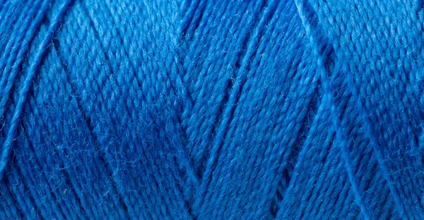 Roll of blue yarn. Macro photo. — Stock Photo, Image