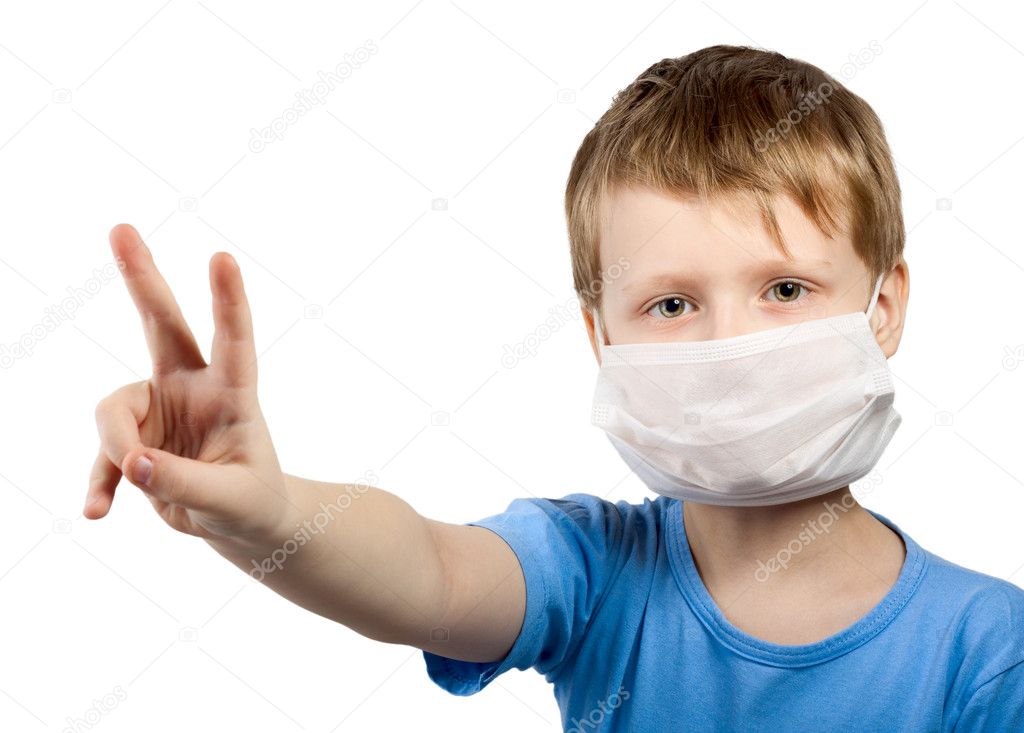 Flu illness child boy in medicine healthcare surgical mask isolated over wh