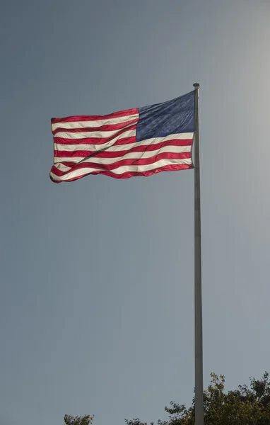 US-Flagge hinterleuchtet Stockbild