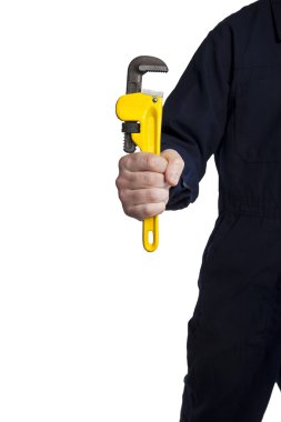 Handyman holding an adjustable pipe wrench clipart