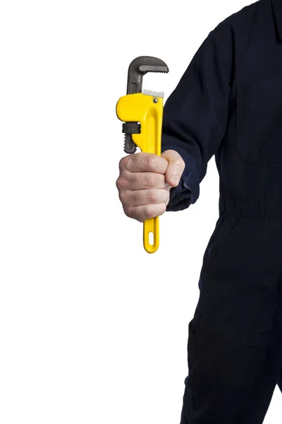 Handyman segurando uma chave de tubo ajustável — Fotografia de Stock