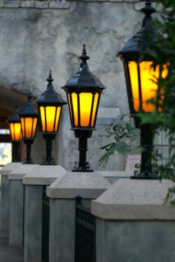 Glowing lanterns on a romantic terrace clipart