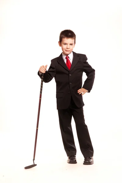 Junge im offiziellen Dresscode mit Golfschläger — Stockfoto