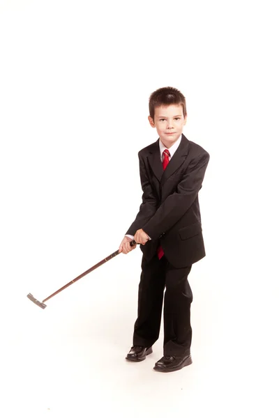 stock image Boy in official dresscode with a golf club