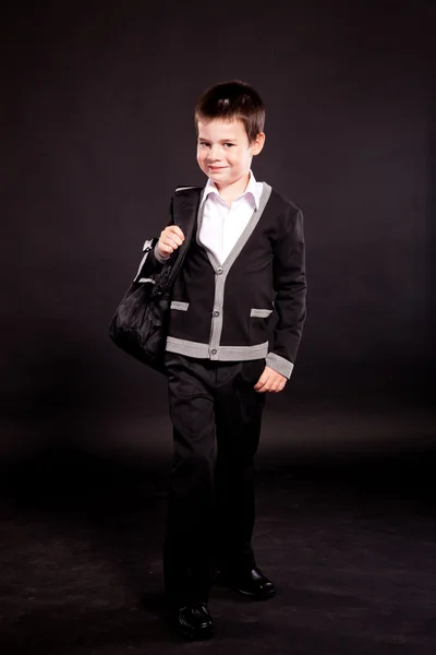 Boy in official dresscode with backpack — Stock Photo, Image