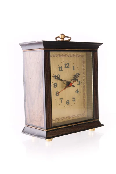 Old-fashion table clock made of wood Stock Picture