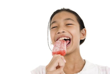 Girl enjoying her ice cream clipart